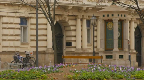 View of a flowerbed and meteorological pole near Zrinjevac park, Zagreb Stock Footage 60804460