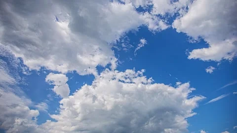 View of fluffy white clouds in a blue sky over Riga, Latvia. Stock Footage 341454189
