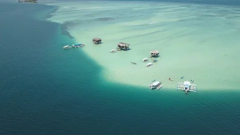 View From Flying Drone of captivating blue lagoon island resort in the Asia. Stock Footage 118993878