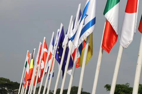 A view of the flying flags of all nations in the wind Stock Photos