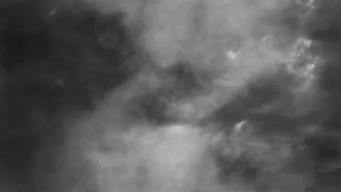 View flying through lightning flashes dark clouds 4k 스톡 동영상 232978754