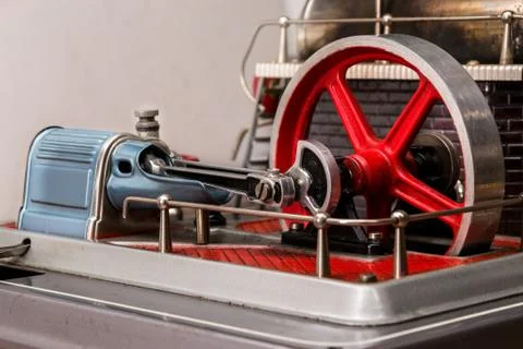 View of the flywheel of a steam engine Stock Photos