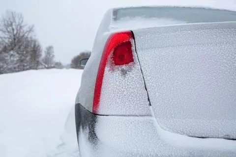 View focused on the back red tail lights of car and car trunk or car boot on Stock Photos