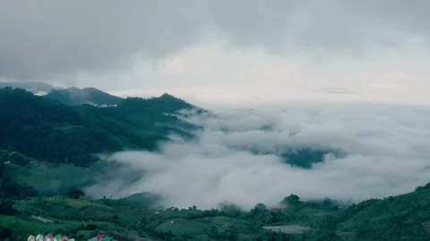 View of foggy or clouds while sunrise sky. A sea of fog is formed from stra.. Stock Footage 322553719