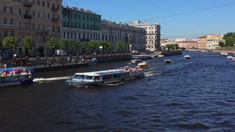 View of the Fontanka River and active movement of river tourist transport Stock Footage 313294096