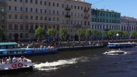 View of the Fontanka River and active movement of river tourist transport Stock Footage 313294100
