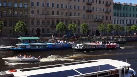 View of the Fontanka River and active movement of river tourist transport Stock Footage 313294123