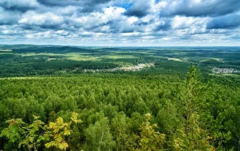 View of forest, mountains, fields, cottages from Lipovaya Mount Stock Photos