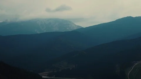 A view of the forested slopes of the mountains range Stock Footage 110810029