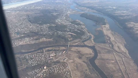View form airplane window flying over Kaunas, Lithuania Stock Footage 175916313