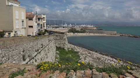 View of fortifications sea wall and marina, Antibes, South of France Stock Footage 50758560