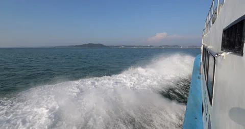 View forward from old passenger ship sailing at full speed, side wake, slow-mo Stock Footage 314773525