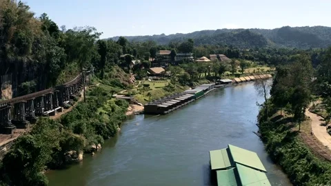 VIEW FORWARD OVER THE KWAI RIVER AND THE DEATH RAILWAY IN THAILAND Stock Footage 169163996
