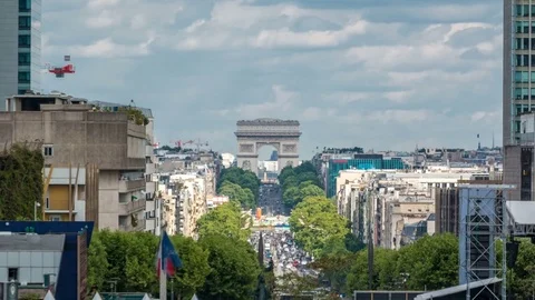 View from fountain in Defense business district to the Arc de Triumph timelapse Stock Footage