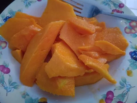 View of fresh mango on a plate Stock Photos