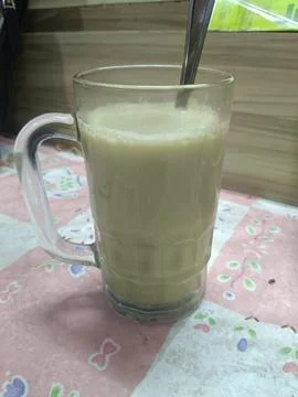 View of fresh matcha latte on the table Stock Photos