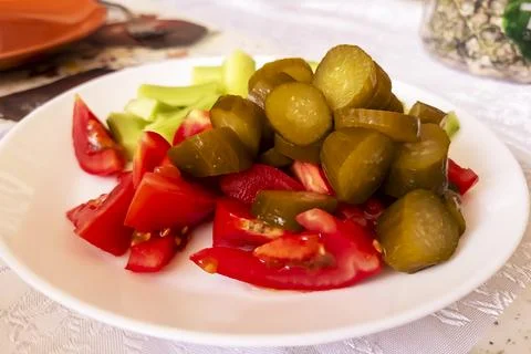 View of fresh pickled vegetables on a plate. Vegetables.. Stock Photos