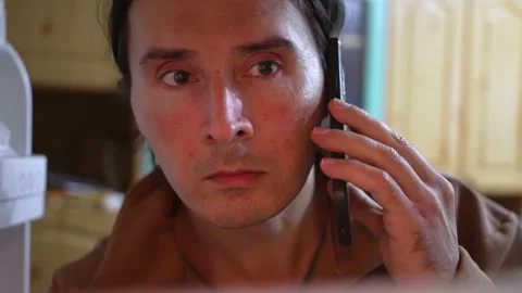 View from fridge of man, having phone call and opening fridge, taking vegetables Stock Footage 220081776