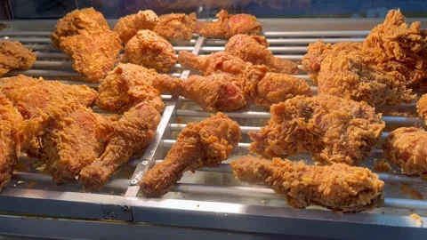 View of fried chicken served in a display case Stock Footage 325784481