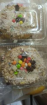 View of fried donuts in small pack Stock Photos