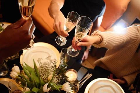 View on friends having drinks in the bar, close-up Stock Photos