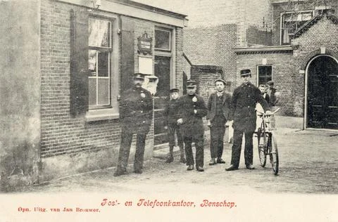 View of the front of the postal and telegraph office in Benschop, with the... Fotos Stock