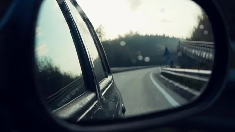 View Of The Front Side Mirror Of The Car While Driving Stock Footage 167606770