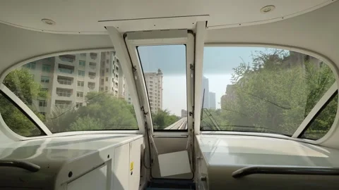 View from the front window of an automated commuter train moving through. Stock Footage 330881937