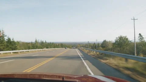 View from the front window of car on highways and national parks of Nova Scotia Stock Footage 266189157