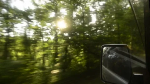 View from a front window of a cross over going across country through the forest Video stock 89023008