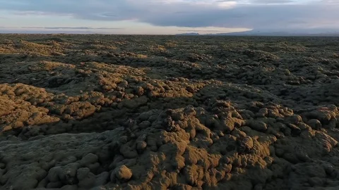 A view of the frozen volcanic lava during sunset. Andreev. Stock Footage 78551987
