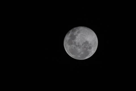 View of a full moon at night Stock Photos
