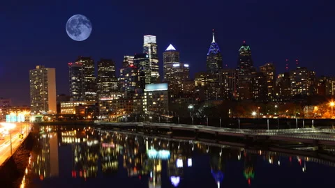 View of full moon rising over the city of Philadelphia, United States, exclus Stock Footage 171416803