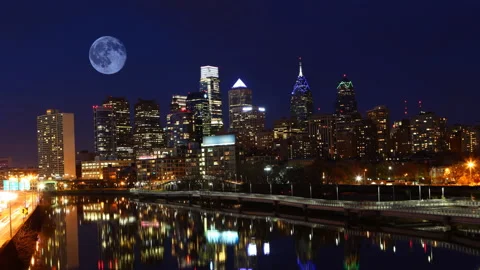 View of full moon rising over the city of Philadelphia, Pennsylvania, United  Stock Footage 171417648