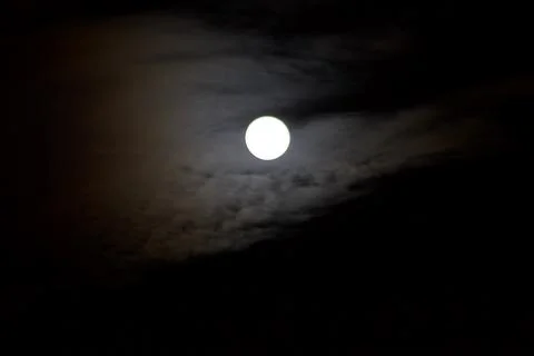 View of the full moon with white clouds Stock Photos