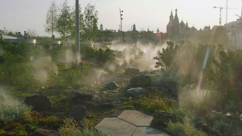 View of functioning sprinkler irrigation system in Zaryadye Park Stock Footage 91994755