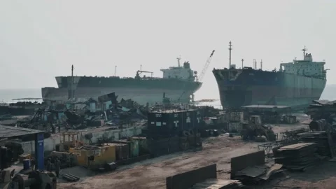 View Of Gadani Ship Breaking Yard With Two Large Ships Moored In Background Stock Footage 166882601
