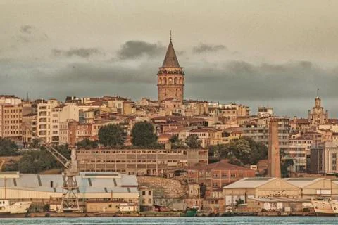 View of Galata Tower From a Cloudy day, yellow filter applied Foto stock