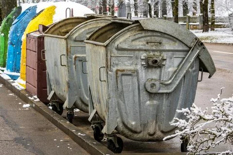 View of garbage containers in city on winter day Stock-Fotos
