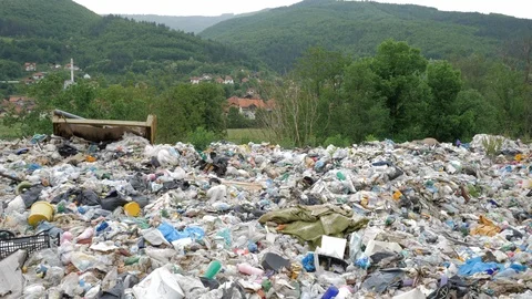 A view on Garbage dump in Nature environment. Pollution of planet concept. Stock Footage 110698695