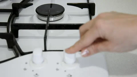 A view of the gas burner that ignites when the electric ignition switch is Stock Footage 148533940