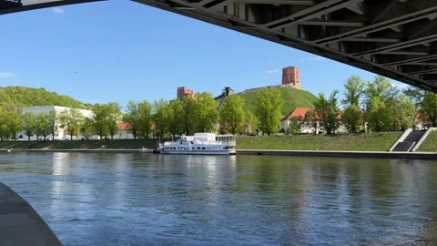 View of Gediminas' Tower from Neris river bank in Vilnius, Lithuania in spring Stock Footage 241210393