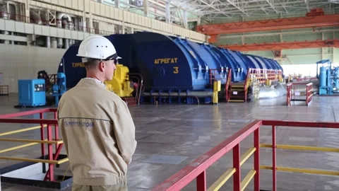 View of the generator room and the turbine of the nuclear power plant Stock Footage 247574792