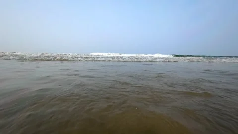 View of Gentle Ocean Waves Rolling and Foaming on the Sandy Beach Shoreline 库存影片 342832423
