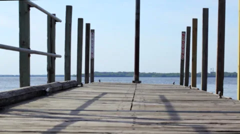 View of gently floating dock and lake Stock Footage 38878404
