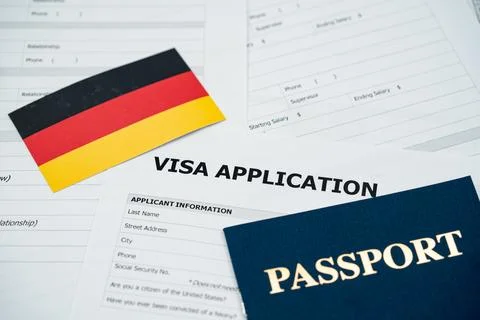 View of Germany visa application form with passport and national flag Stockfoto's
