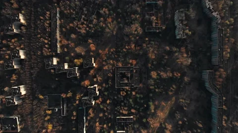 View of ghost city of Pripyat with Chernobyl nuclear power plant and sarcophagus Stock Footage 159265574