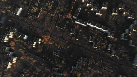 View of ghost city of Pripyat with Chernobyl nuclear power plant and sarcophagus Stock Footage 159265577