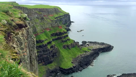 View of Giant's Causeway featuring cliffs in Northern Ireland Stock Footage 338332792