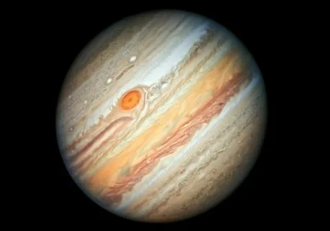 View of the gigantic planet jupiter showing its swirling atmospheric bands. Stock-Fotos